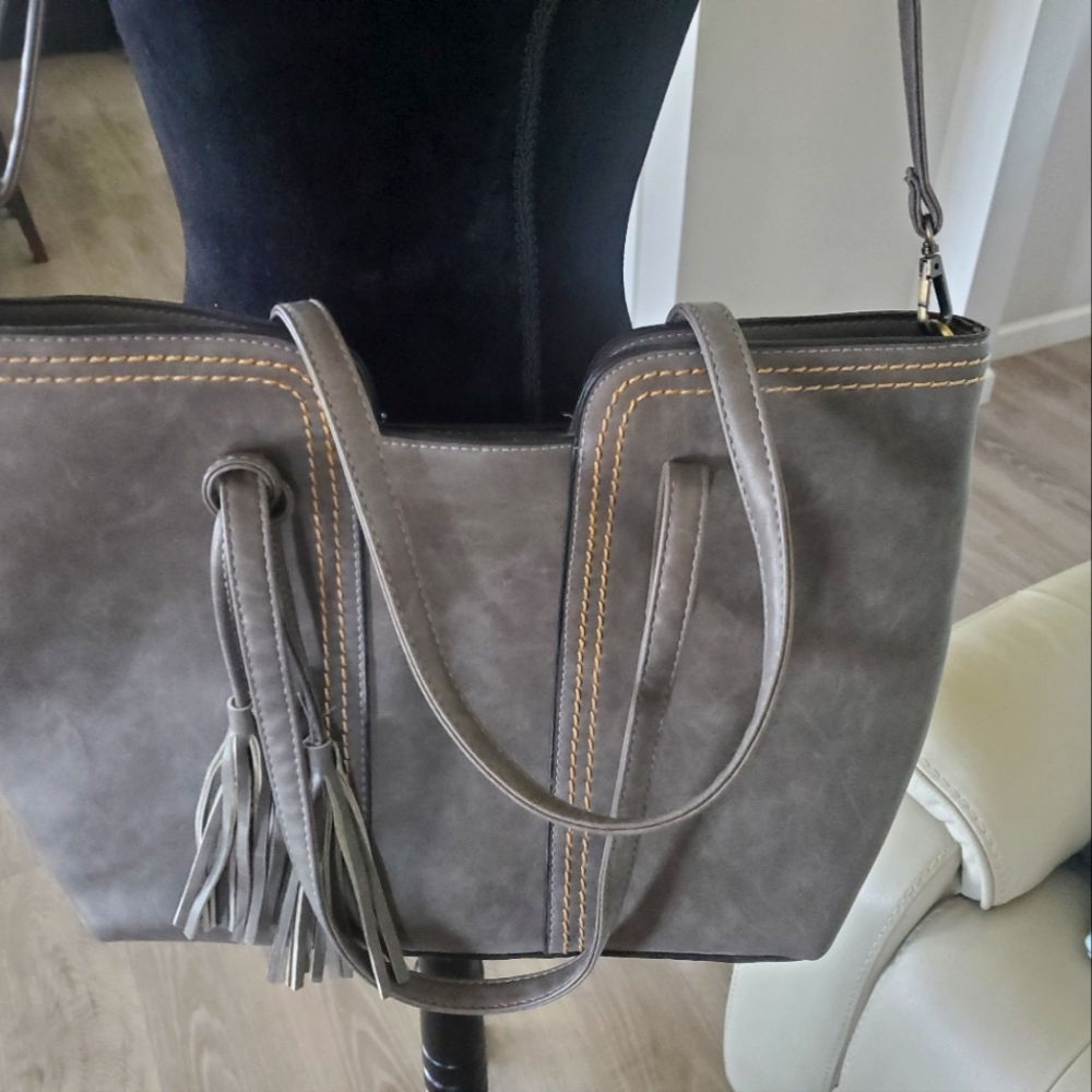 Large vegan leather tote bag with tassel and decorative stitching